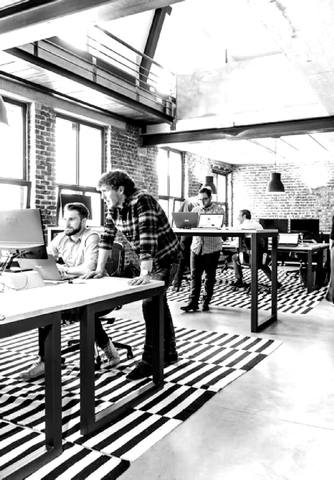 Studio session: the team around a table of laptops
